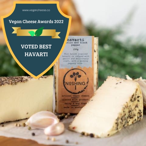 noshing havarti roast garlic and pepper best havarti vegan cheese awards 2022 badge